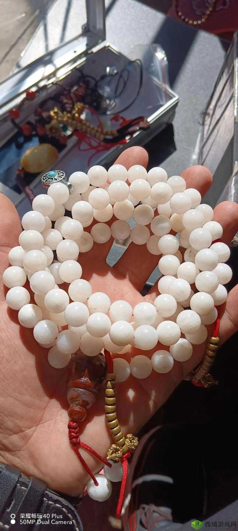 呜呜呜可以把佛珠拿出去吗:这到底是怎么回事呢